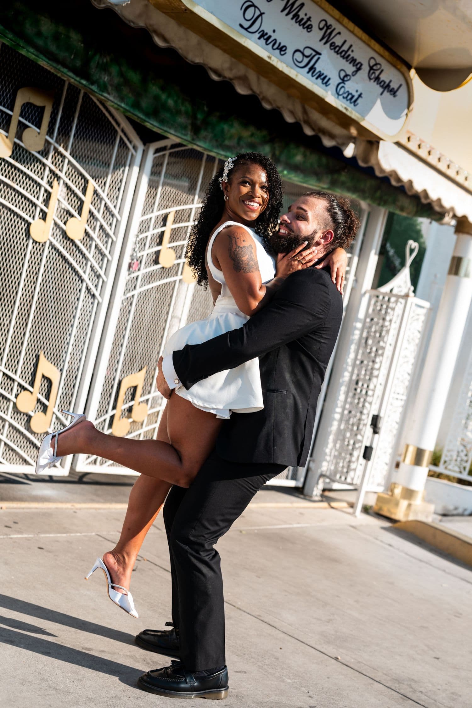 A playful embrace outside the chapel