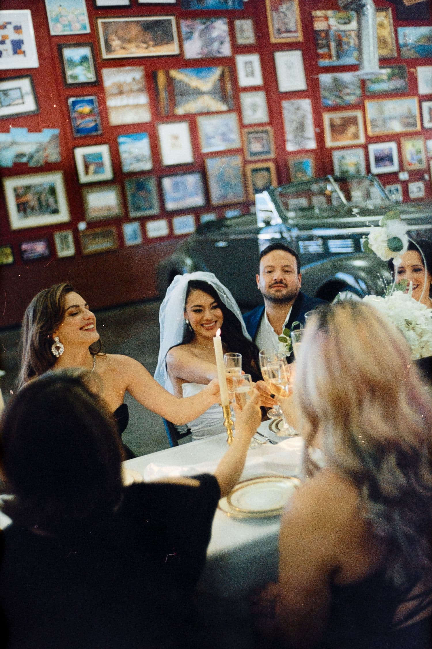 The wedding party toasting